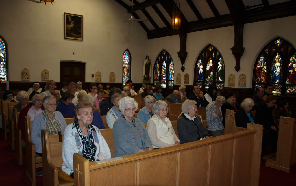 Residents at the anniversary Mass